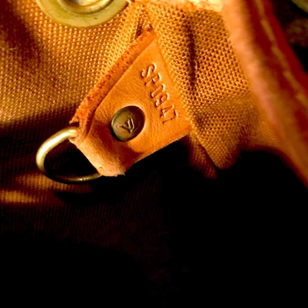 This is an original Louis Vuitton mini montsouris backpack purse. Made 04, 1997.